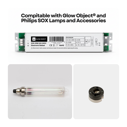 Electronic ballast, lamp, and BY22D socket compatible with Glow Object and Philips SOX lamps on a white background.